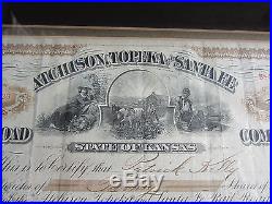 FRAMED 1894 STOCK FOR THE ATCHISON, TOPEKA & SANTA FE RR WITH RARE TRANSFER